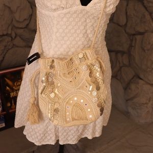 Express coin ivory/cream bag